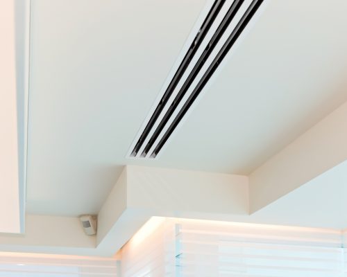 Plaster ceiling with grating the air conditioner